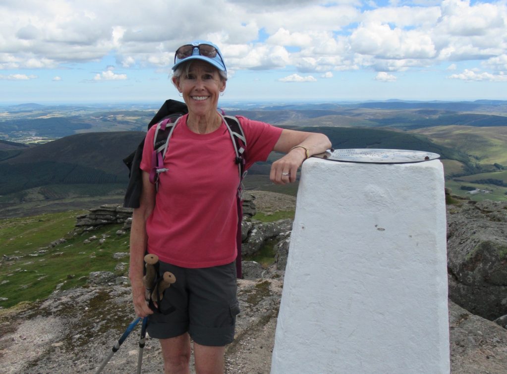 On Ben Rinnes peak with a view across the region of Moray