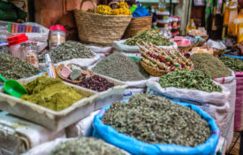 Fresh herbs in baskets in the medina market in Marrakesh Morocco