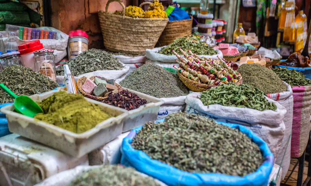 Fresh herbs in baskets in the medina market in Marrakesh Morocco