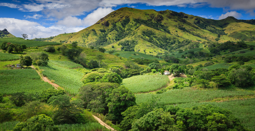 Sun and clouds play over the lush green of Viti Levu Fiji