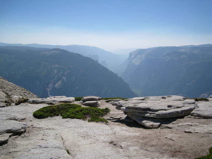 Once you make it to the top, the view from Half Dome over Yosemite National Park is spectacular