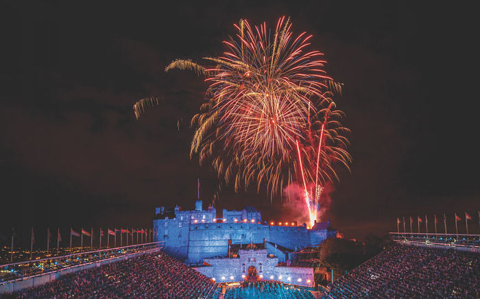 A military band performing on the esplanade during The Royal Edinburgh Military Tattoo, Edinburgh Castle, Edinburgh.