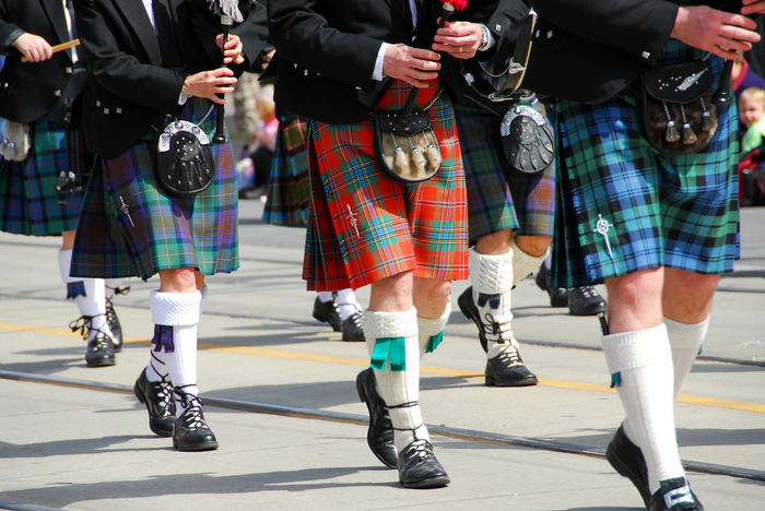 Pipers in colorful kilts