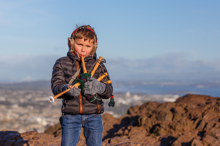 Youthful bagpiper