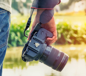 A tourist has his camera at the ready