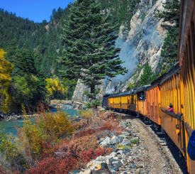 A train ride next to a river through Colorado near Silverton