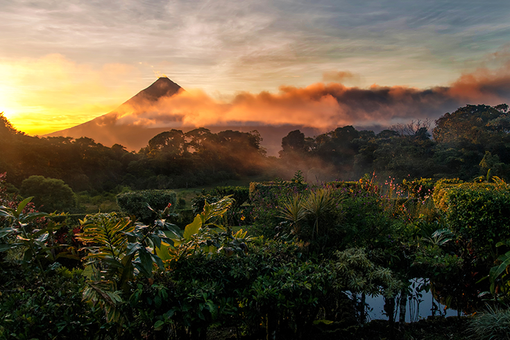 Costa Rica sits in a lovely morning fog as the sun rises