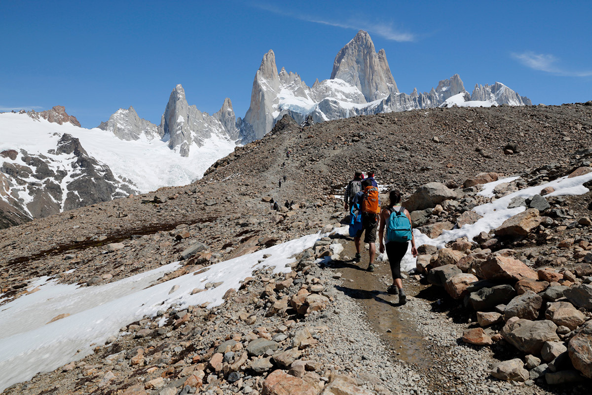 a group of people hiking in patagonia