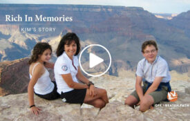 mother and children sitting at top of grand canyon on off the beaten path travel adventure