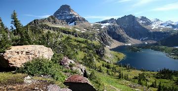 overlooking mountains and a lake in glacier national park